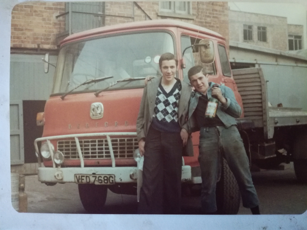 FRIENDS: A photo of Paul McDonald with Gerard ‘Coke’ Grogan, right, beside the Bedford TK lorry, driven by Frank Tierney, in the yard of Casey’s Bottling Plant, taken just months before the shooting