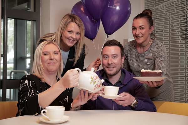 At a coffee morning to mark World Mental Health Day are Annette Huston, Maria Daykin and Seáinín Ward from Danske Bank with Jamie Greer from Action Mental Health.\n