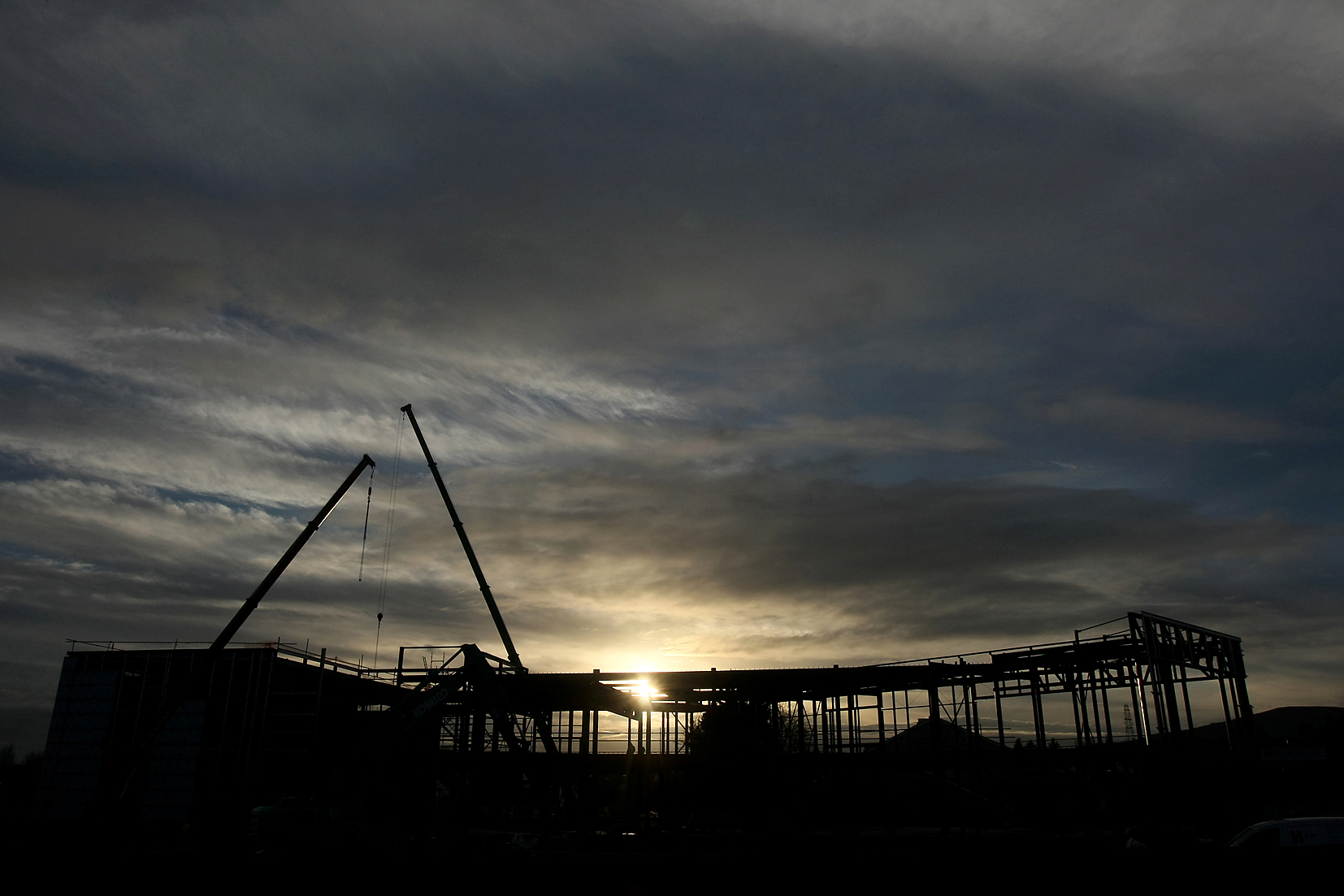 The sun goes down behind the new Andersonstown Leisure Centre