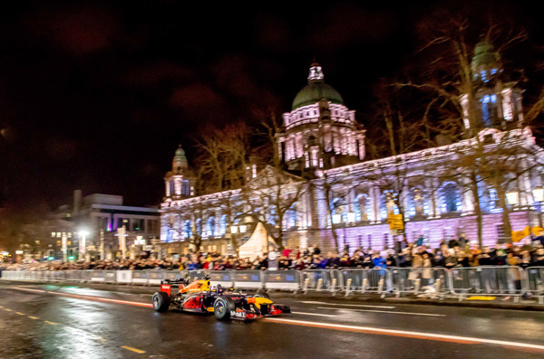 David Coulthard, a 13-time Grand Prix winner, drives the Red Bull Formula 1 car in front of City Hall in Belfast during the F1 Belfast showrun on Saturday night 