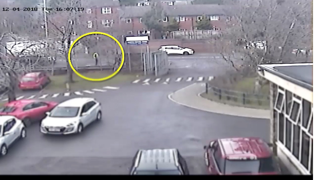 The new CCTV footage shows the gunman walking down the Glen Road outside Christian Brothers School
