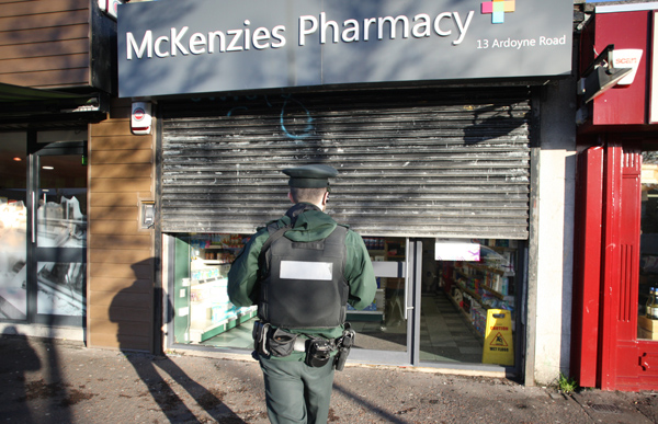 : Police at the scene of the chemists where a quantity of prescription drugs was stolen on Monday afternoon. 