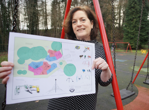 STATE-OF-THE-ART: Cllr Geraldine McAteer with the new plans for Shaws Bridge play park