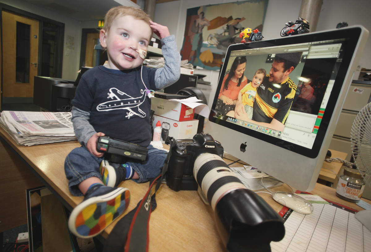 Little Dáithí Mac Gabhann was at home in the Andersonstown News office this week