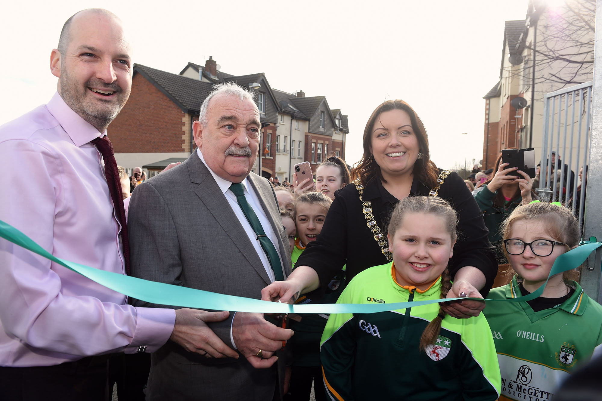 Lord Mayor Deirdre Hargey with Andrew McCracken (Chief Executive of Community Fund for Northern Ireland), Davitts’s Chairman, Tommy Shaw and club supporters Naoibh Heaney and Sophie Skelly at the official opening of new community sports and recreation facilities at Davitt Park