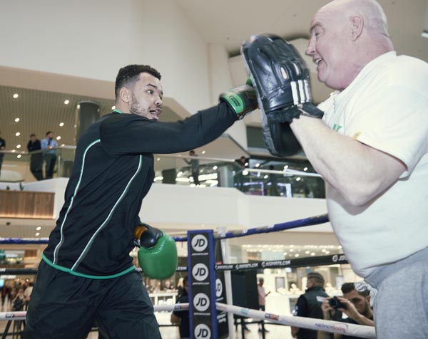 Tommy McCarthy works the pads with trainer, Tony Dunlop ahead of tonight\'s WBA Inter-Continental cruiserweight title fight against Richard Riakporhe in Peterborough\nPicture By Mark Robinson.