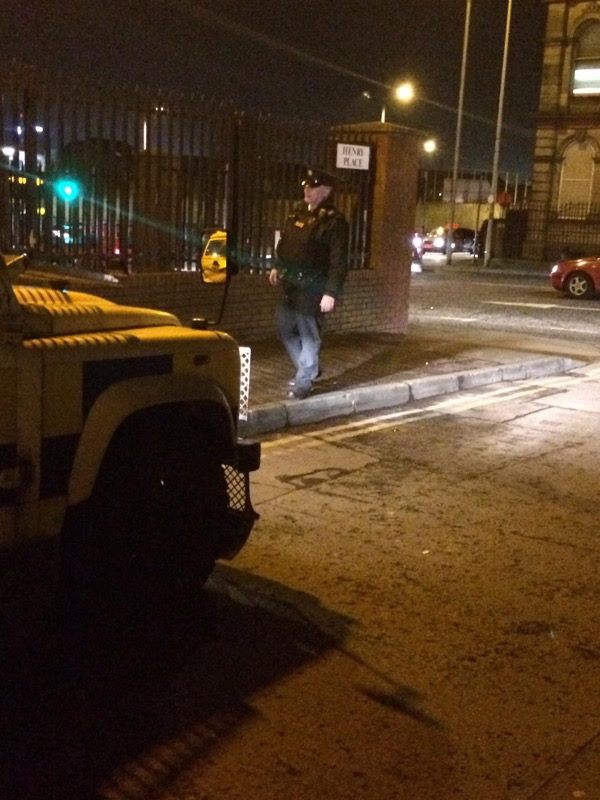 A PSNI officer in Henry Place on Tuesday night