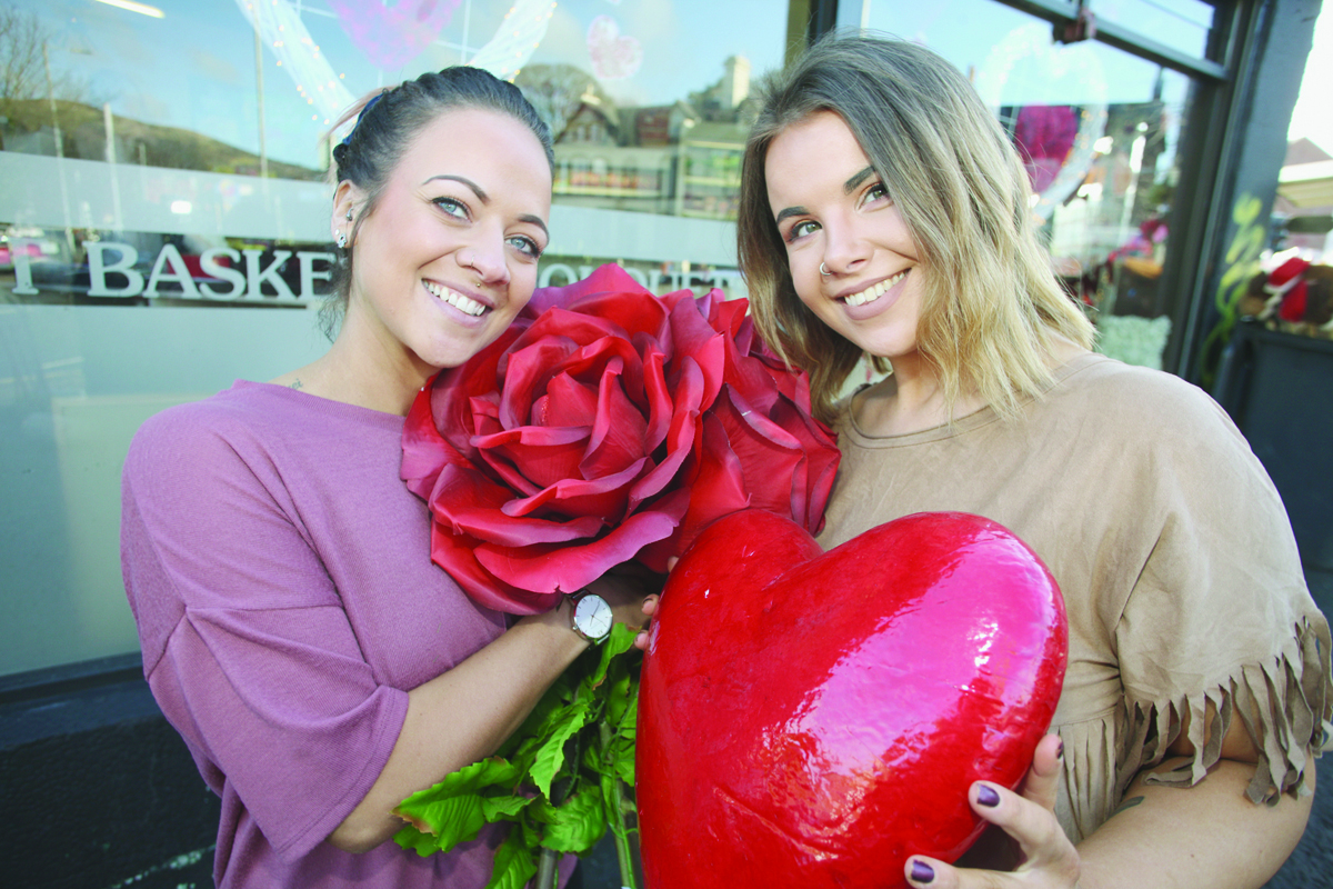 Thinking big for Valentine\'s at Fortwilliam shops are Gráinne Caldwell and Samantha Hutchman 