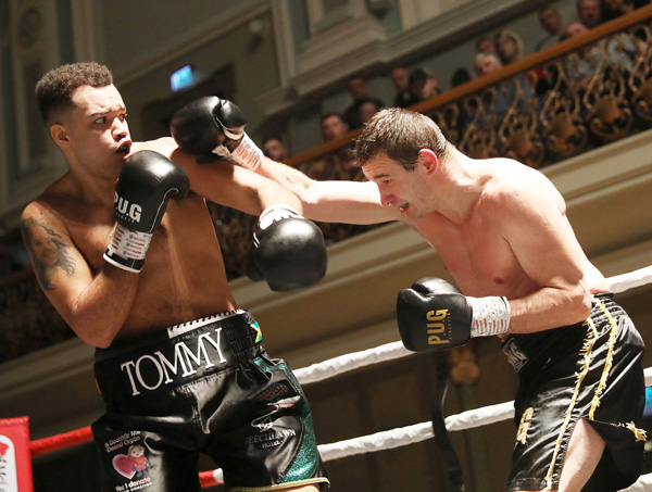 On the \'Night to Remember\' bill at the Ulster Hall on Saturday night, cruiserweight Tommy McCarthy – sporting a Dáithí Mac Gabhann organ donation logo on his shorts – slips a looping right hand from Juri Svacina of the Czech Republic. The West Belfast man won comfortably on points \n\nTommy McCarthy v Jiri Svacina\n