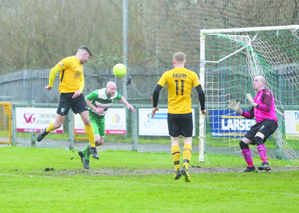 Martin McDonald heads the opening goal for St James’ Swifts during last Saturday’s remarkable 8-5 win over West Belfast rivals Donegal Celtic and new player/manager Dermot McVeigh insists his side must shore up their defence ahead of Saturday’s trip to Dunloy FC 