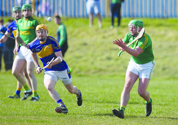 Ciaran Orchin (Rossa) and Paudie Shivers (Dunloy), pictured during last year’s league meeting between the sides, could clash again this Sunday at Shaws Road as the hurling leagues get underway