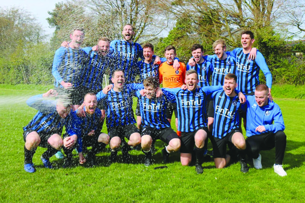 Aquinas celebrate following their promotion to Division 1B after winning Division 2A in their first season as an Intermediate side