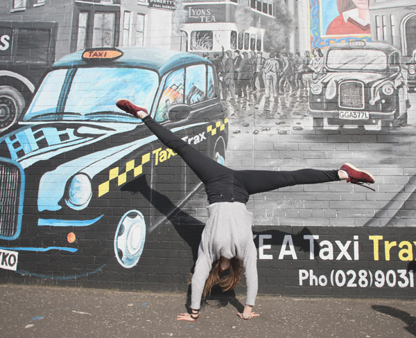 French student Anouk Limonne is full of the joys of spring on a visit to the International Wall