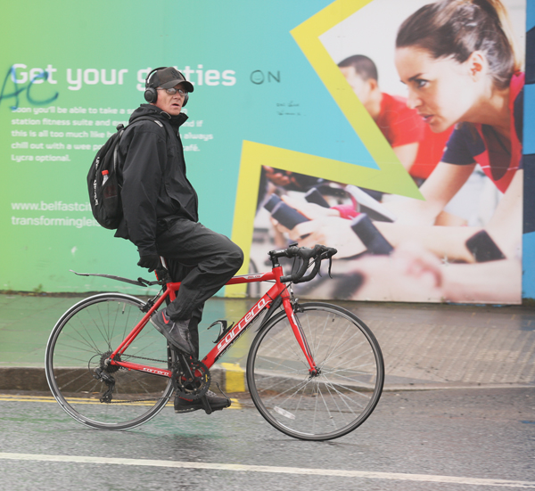 \'Look no hands\' as a cyclist makes his way up through Andersonstown