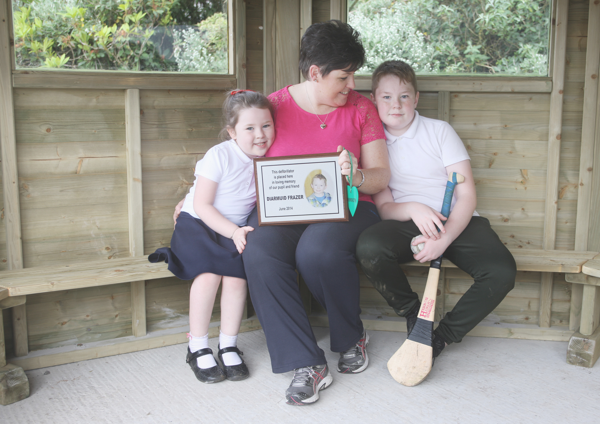 DIARMUID’S LEGACY: Tina Frazer, her son Cormac and daughter Orlaith in the new outdoor classroom