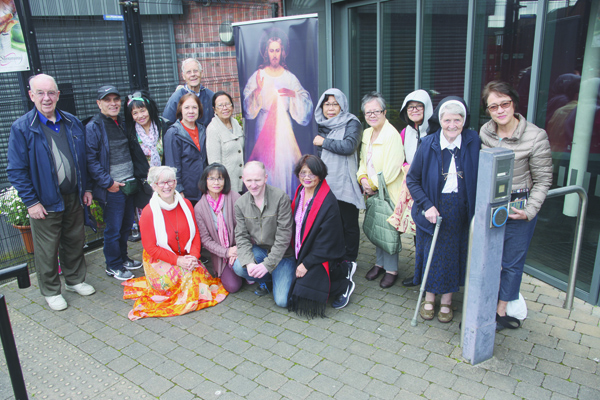 RENEWING ACQUAINTANCES: Friends from the United States – back for another visit – with members of the Divine Mercy group centre at Sacred Heart church