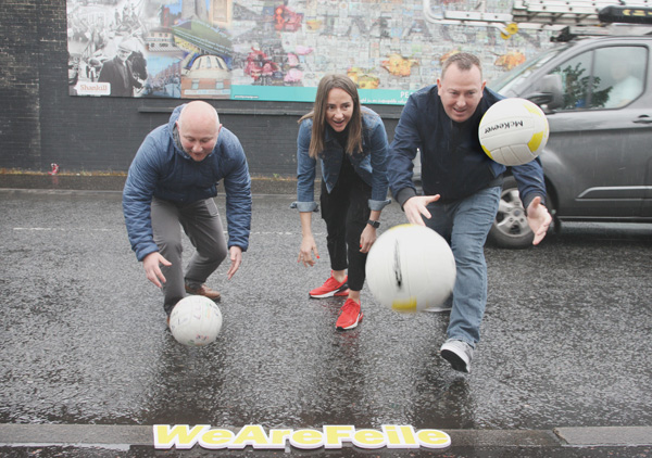 Conor Barnes (Ardoyne Kickhams), Jane Adams (Manny’s) and Gerard Mulhern (PG) in Northumberland Street for the launch of the Féile an Phobail Cribby World Cup Competition 
