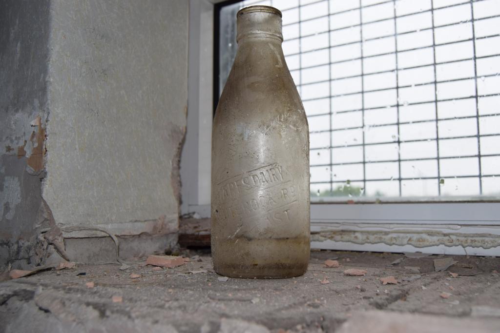 FIND: The milk bottle that was unearthed at the old St Thomas’ Secondary School this week\n