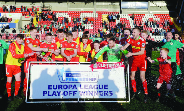 Cliftonville, pictured celebrating their 2-0 extra-time Europa League Play-Off victory over Glentoran at Solitude last month, have been drawn against Barry Town United in the preliminary round of the competition with the first leg scheduled for later this month