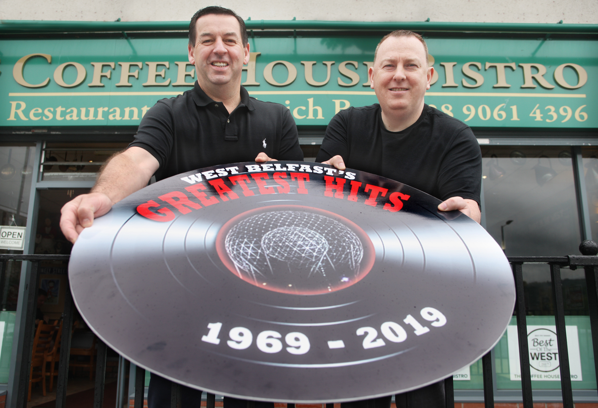 ROLLING BACK THE YEARS: Jim McIlwaine from the Coffee House, left, and the Andersonstown News’ Gerard Mulhern invite readers to West Belfast’s Greatest Hits