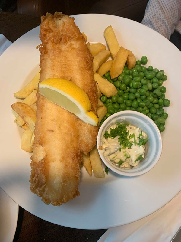 CLASSIC: Fresh cod served with tartar sauce, mixed salad and house fries – the fish is delivered fresh daily