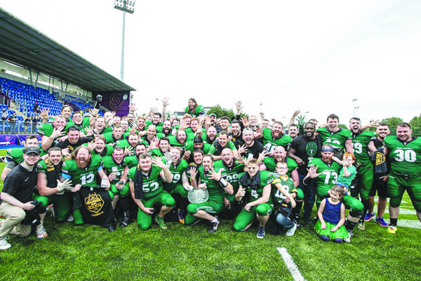Belfast Trojans celebrate with young fans after their 24-10 win over South Dublin Panthers on Sunday