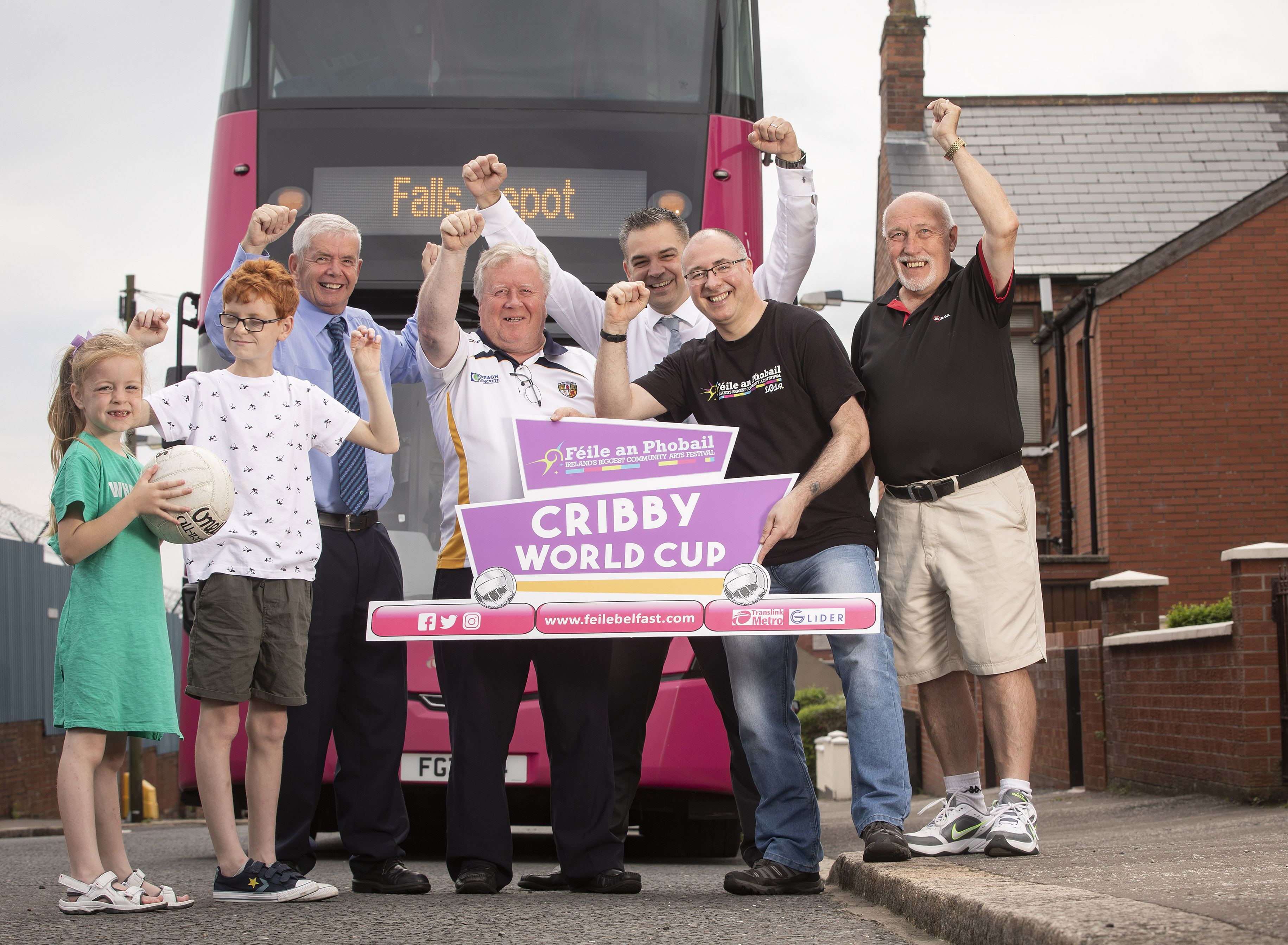 Getting ready for the Translink Féile Cribby World Cup are (l-r) brother and sister Eithne and Seádhna, Translink’s Kevin Wallace, Robert McClenaghan (referee), Translink’s Sean McGreevy, Kevin Morrison and Gerry McClory (referee). Picture by Brian Morrison.\n