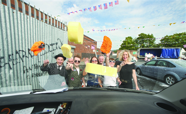 Workin\' at the car wash – the Community Food Bank held a Hollywood-themed wash-and-dry at Ardoyne\'s Flax Centre and raised an impressive £1,135 plus food donations