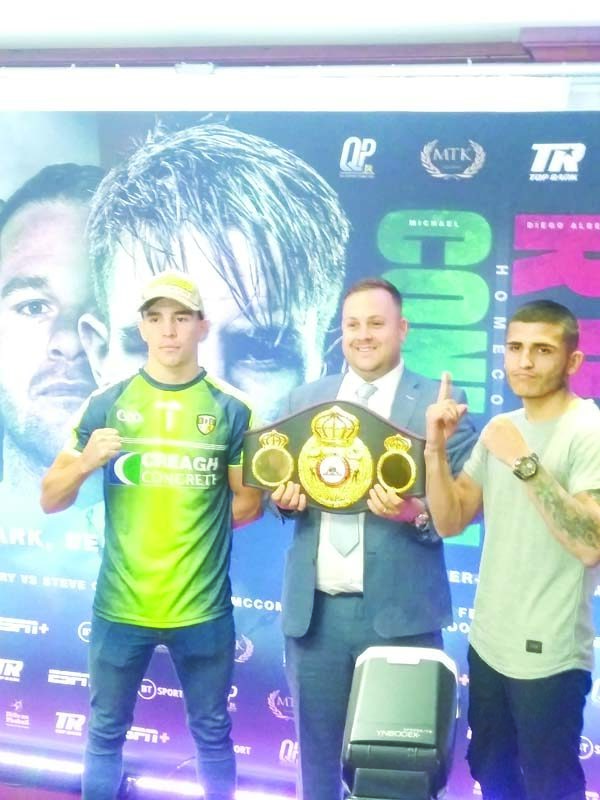 Michael Conlan and Diego Ruiz with Lee Eaton who holds the WBA Inter-Continental featherweight strap they will fight for on Saturday