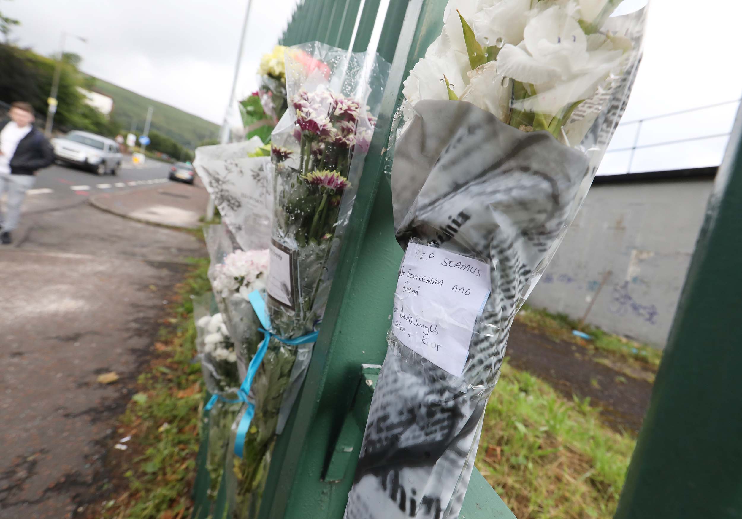 70-year-old Seamus Conlon died following a crash outside Belfast City Cemetery on Saturday