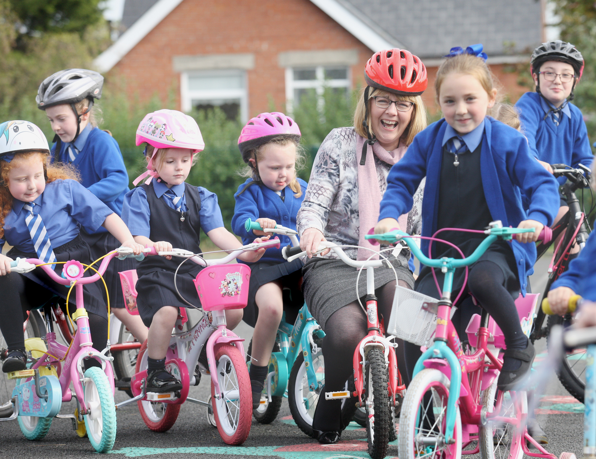 Principal of Mercy Primary School Elaine Loughran leads the way as part of Ride Your Bike To School Week 
