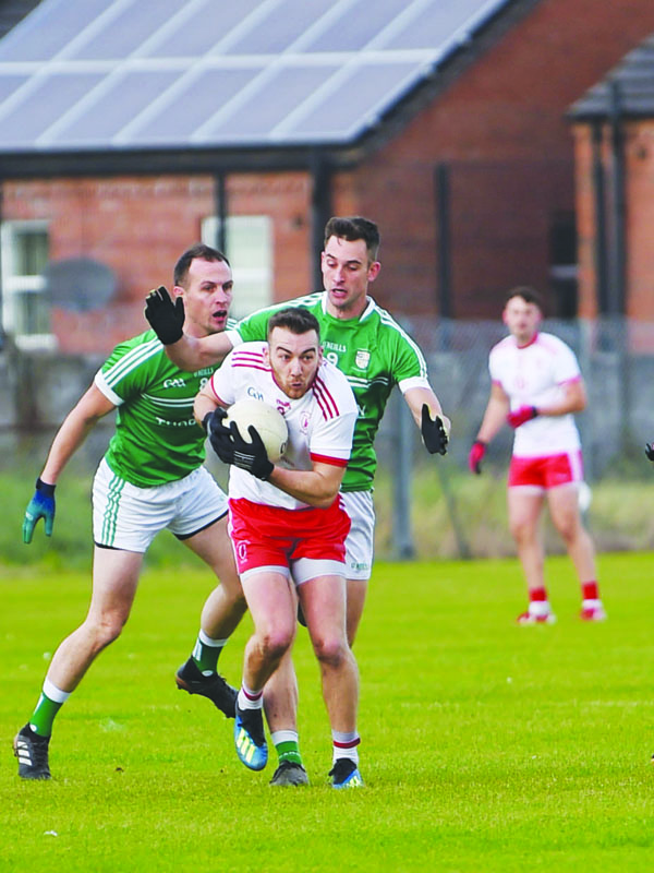 Kevin Quinn evades Gerard McCann during last year’s quarter-final replay when Cargin dethroned Lámh Dhearg. The teams return to Corrigan Park for the final this Sunday with the Red Hands aiming to redress the balance against the defending champions 
