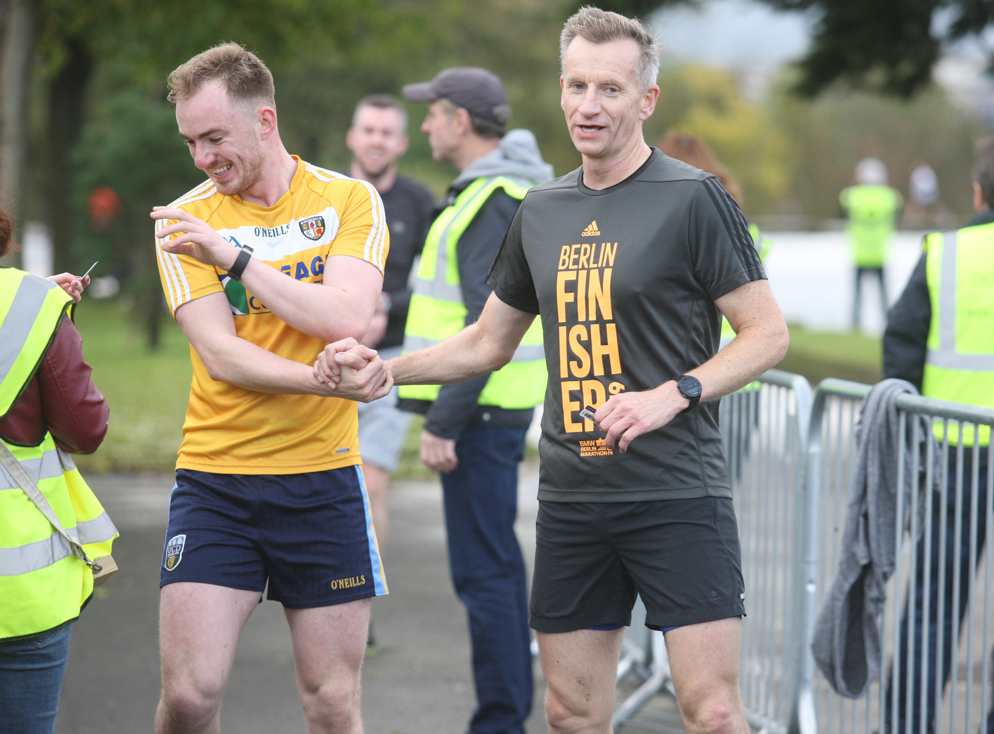 The DUP\'s Brian Kingston (right) finishing the Waterworks park run with a handshake