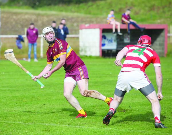 Gort na Mona’s Padraig McHugh hailed the influence of team-mate Padraig McCaffrey, pictured in action in the Antrim JFC final against St Paul’s, after the midfielder hit three points from play in their narrow win over St Eunan’s of Letterkenny as they booked a semi-final meeting with Newry Shamrocks