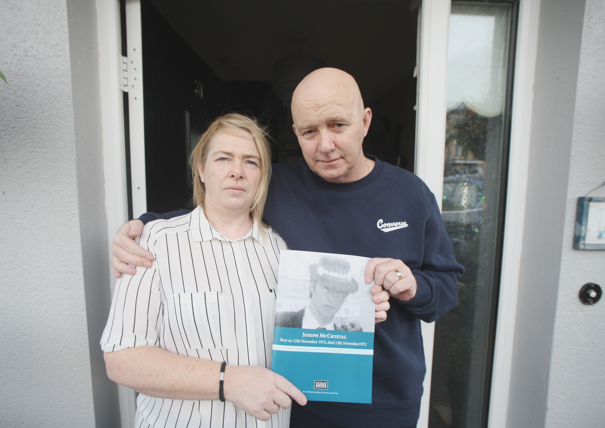 TOGETHER: Donna and Joe McCrystal holding the report into their father’s murder