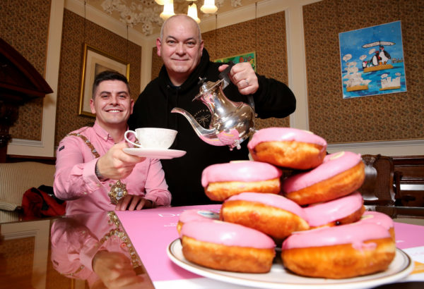 GOING PINK: Seán Smyth pours a cup of coffee for Lord Mayor Danny Baker in the Mayor’s Parlour