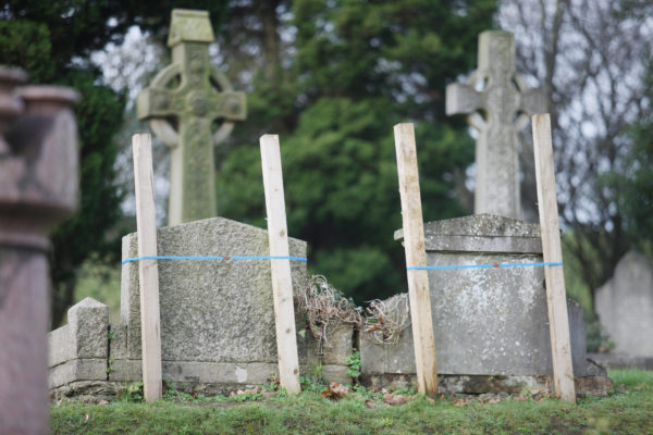 INSPECTION: Scores of graves in the City Cemetery have been marked in this way as needing repair