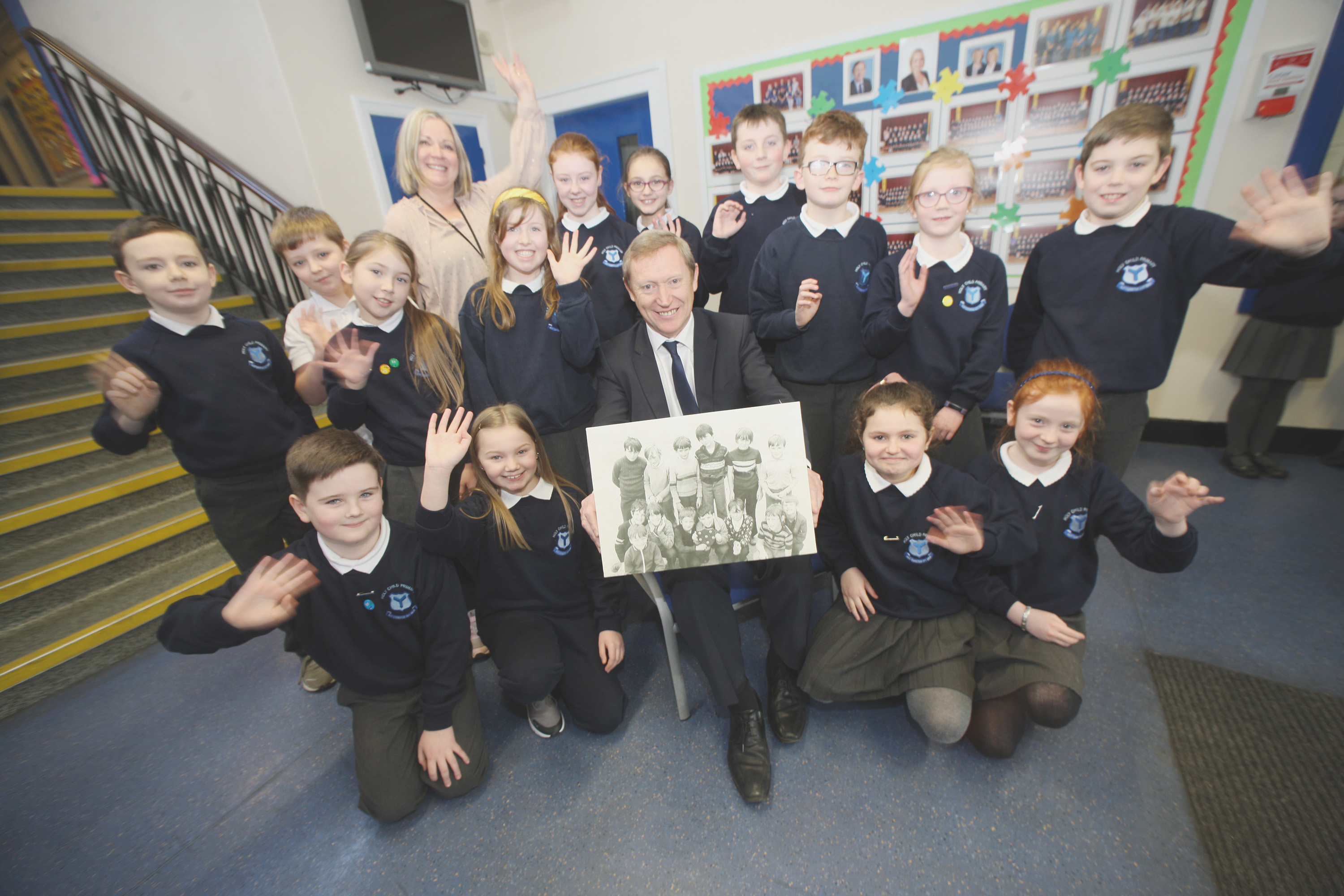 NOW AND THEN: Holy Child  Primary School’s current councillors and vice-principal Mrs Deery wish Mr Short good luck with his retirement