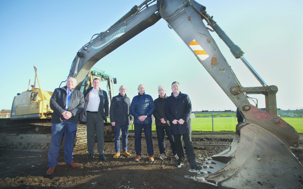 Pictured at Monday’s sod-cutting ceremony are: (L-R) Oliver Galligan (Ulster GAA President), Ciarán McCavana (Antrim GAA chairman), Paul Maskey (West Belfast MP), Gerry McCann (St John’s chairman), Denis Rocks (Central Council) and Collie Donnelly (Corrigan Park redevelopment project chairman).
