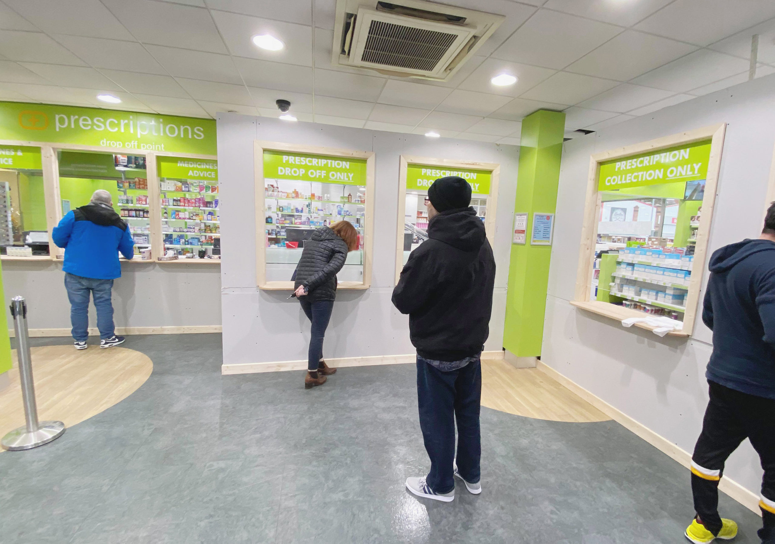 Windows go up in West Belfast chemist shops