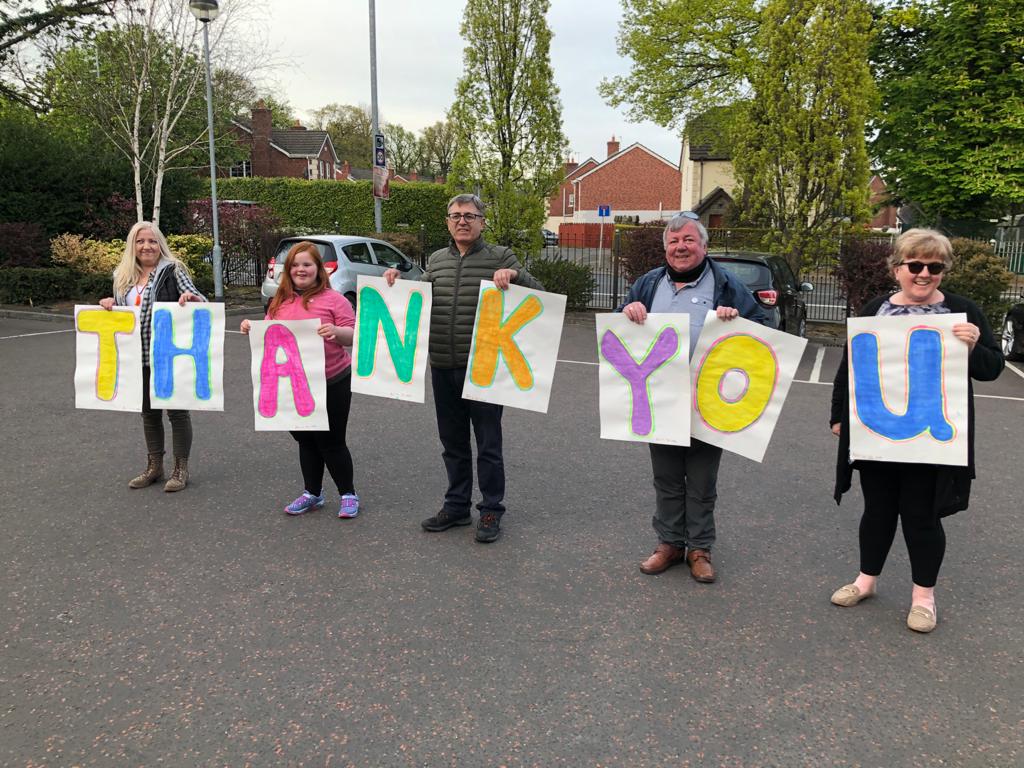 SALUTING CARE HOMES: Relatives of residents of Ambassador Care Home in North Belfast gather to thank staff