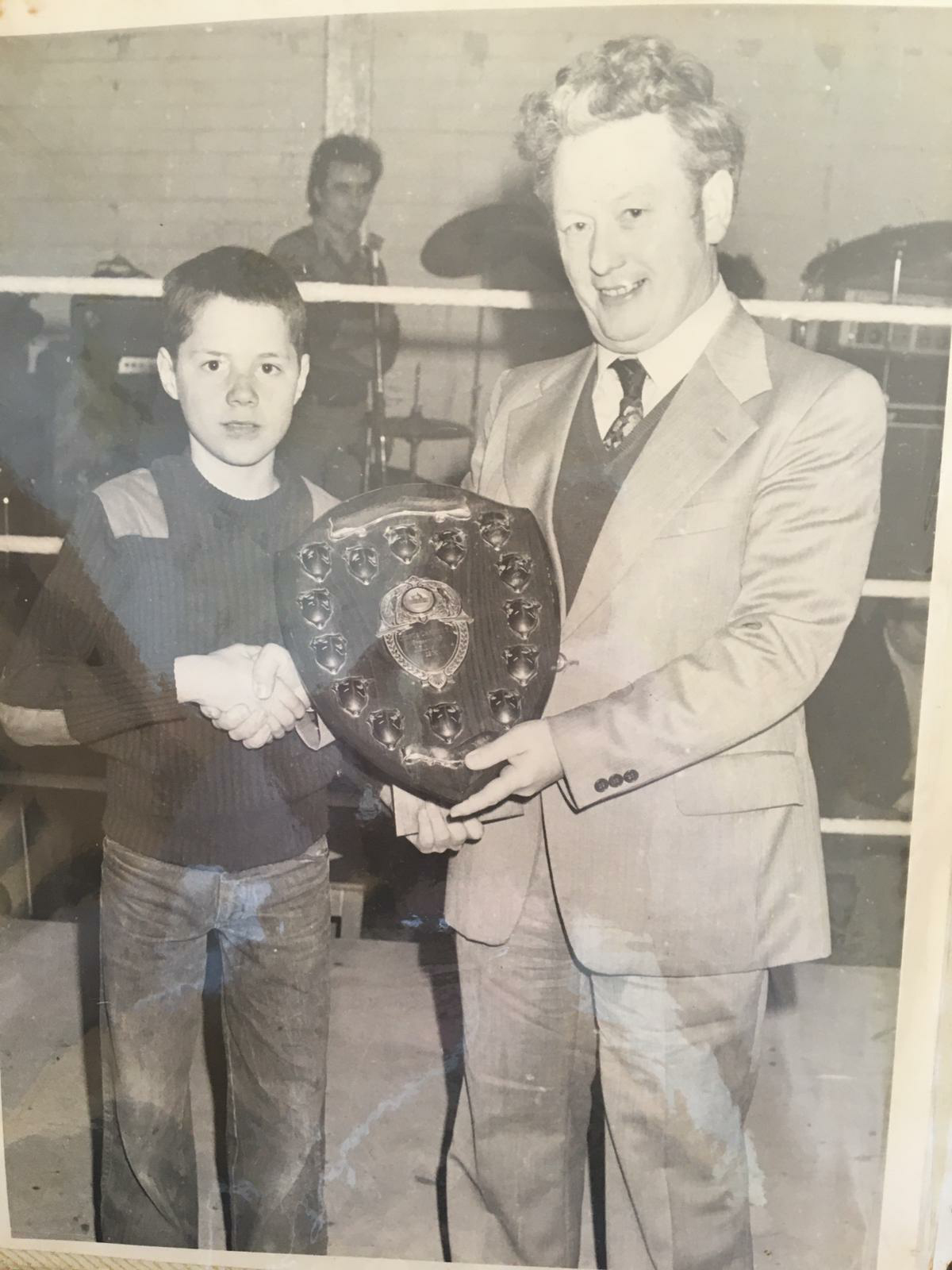 HONOURS: Peter accepting boxing award in his youth for Corpus Christi ABC