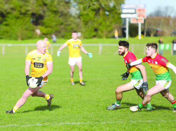 Antrim manager Lenny Harbinson believes that players like Paddy Cunningham (pictured in action against Carlow) will have unfinished business with the county team following the disruption to the season following the Covid-19 outbreak
