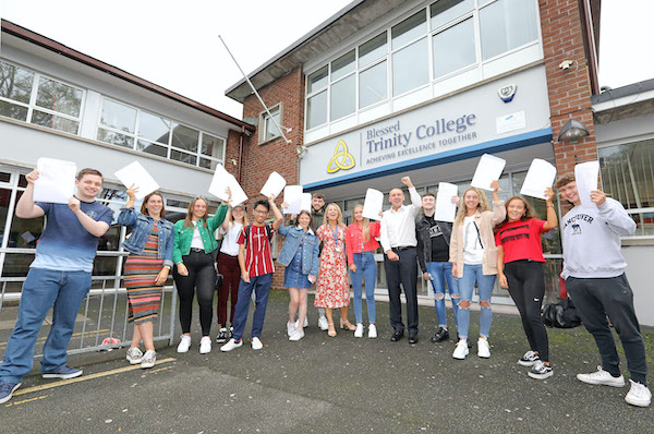 Blessed Trinity College, A\'Level Results. pictured: Principal Jim McKeever and Joan McCartan (Assistant VP) with some of the high scoring students\n\n1508JC19