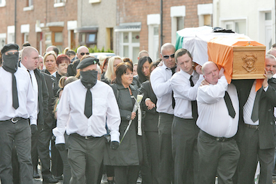 FEUD VICTIM: The funeral of Tommy Crossan leaves Rodney Parade in 2014. F