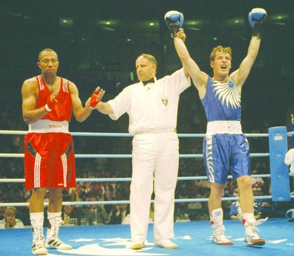 Brian Magee celebrates victory over Randall Thompson at the 1996 Olympic Games in Atlanta
