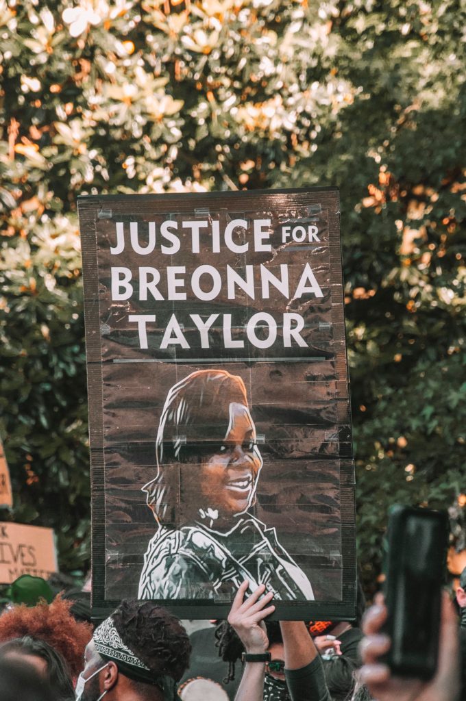 PROTEST: Justice for Breonna Taylor, shot dead in her home in Louisville, Kentucky, in March of this year is carried at a Black Lives Matter protest in Atlanta, Georgia. Photo by Maria Oswalt, Unsplash.