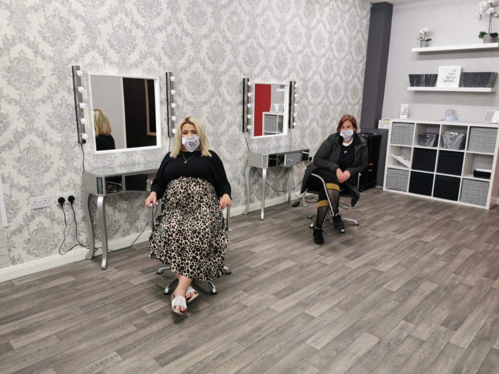 A CUT ABOVE: Barbers' Den staff ready to roll